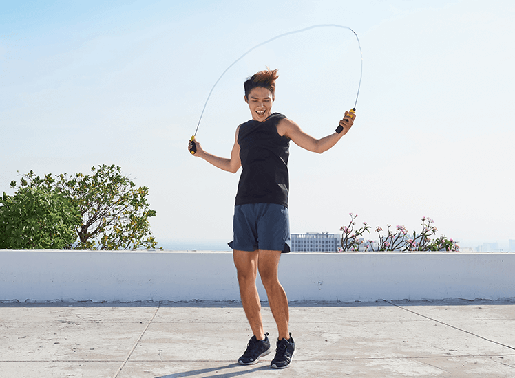 Boy engaging in skipping exercise