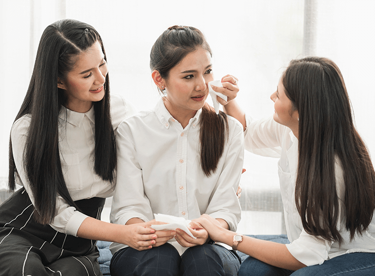 Three women celebrating victory over depression - mental health concept