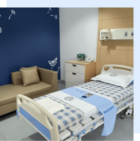 get-confined-bed An empty bed in a Maxicare hospital room